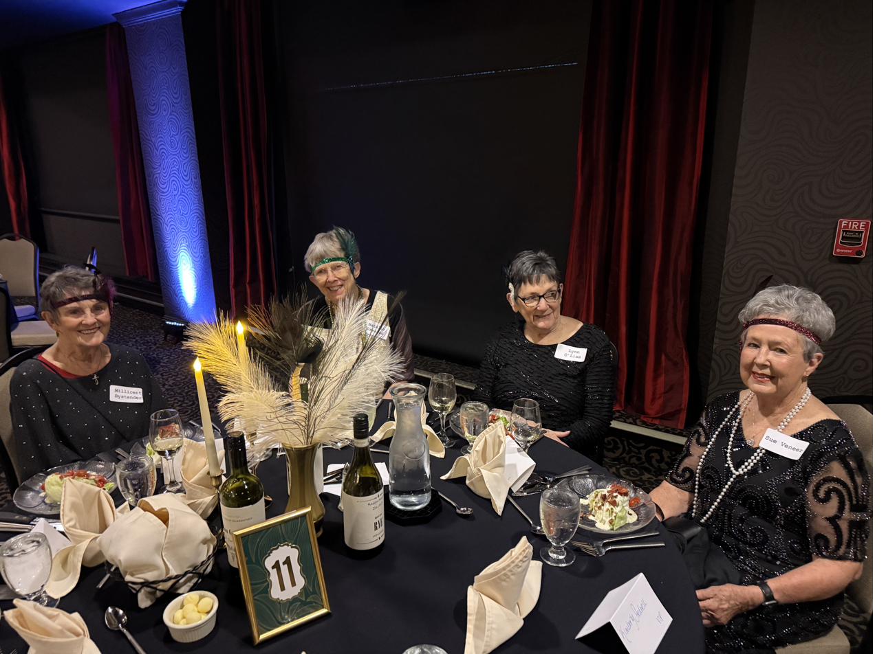 Guests seated at themed tables